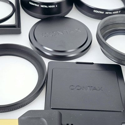 [Pre-owned] Contax Accessories Lot — Lens Hood, Caps, Adapter Ring, Filter — Near MINT — Japan #2471