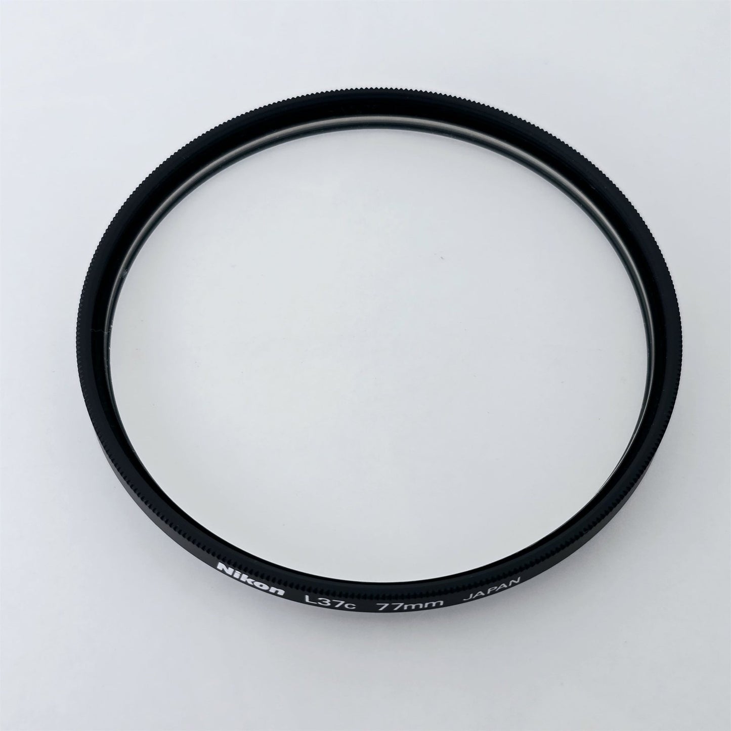 [Pre-owned] Nikon L37C 77mm UV Protective Lens Filter — Mint — Japan #5470