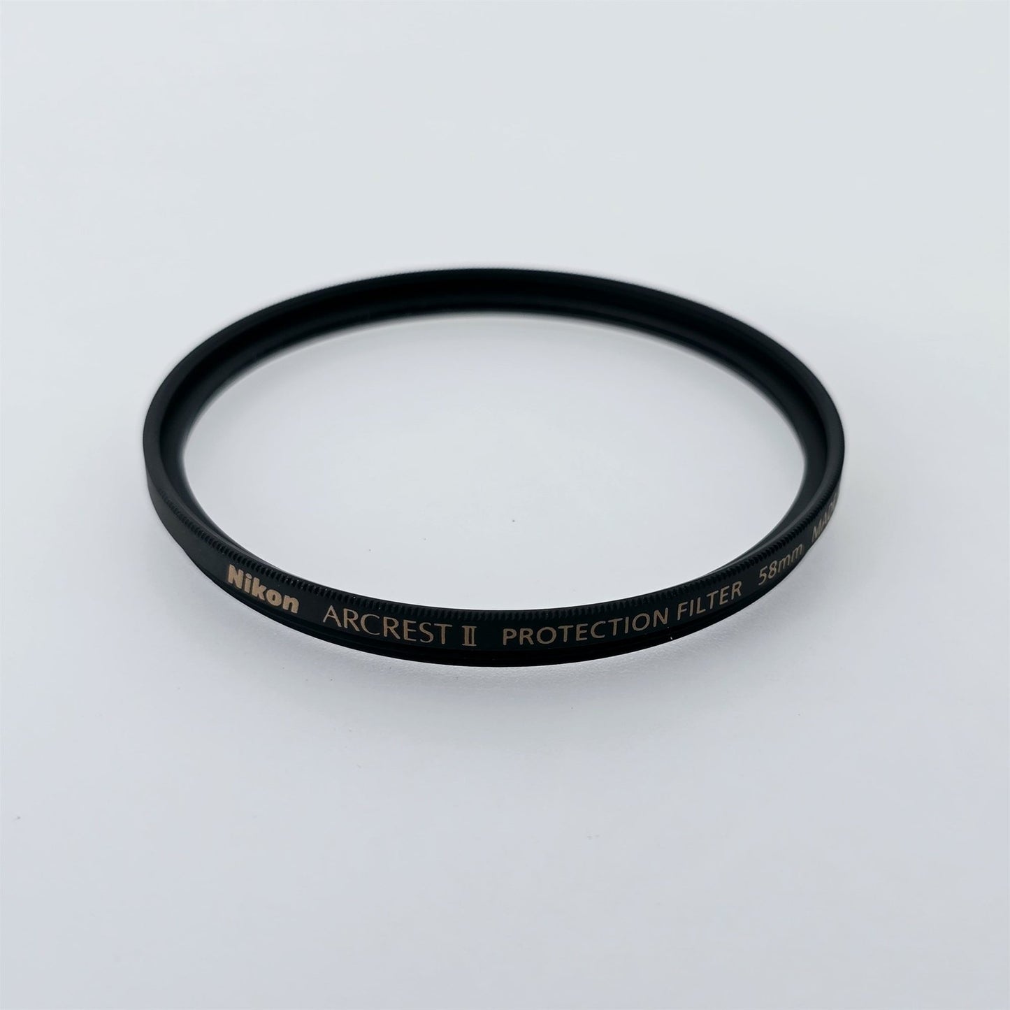 [Pre-owned] Nikon Arcrest II 58mm Protection Filter — Near Mint — Japan #5304