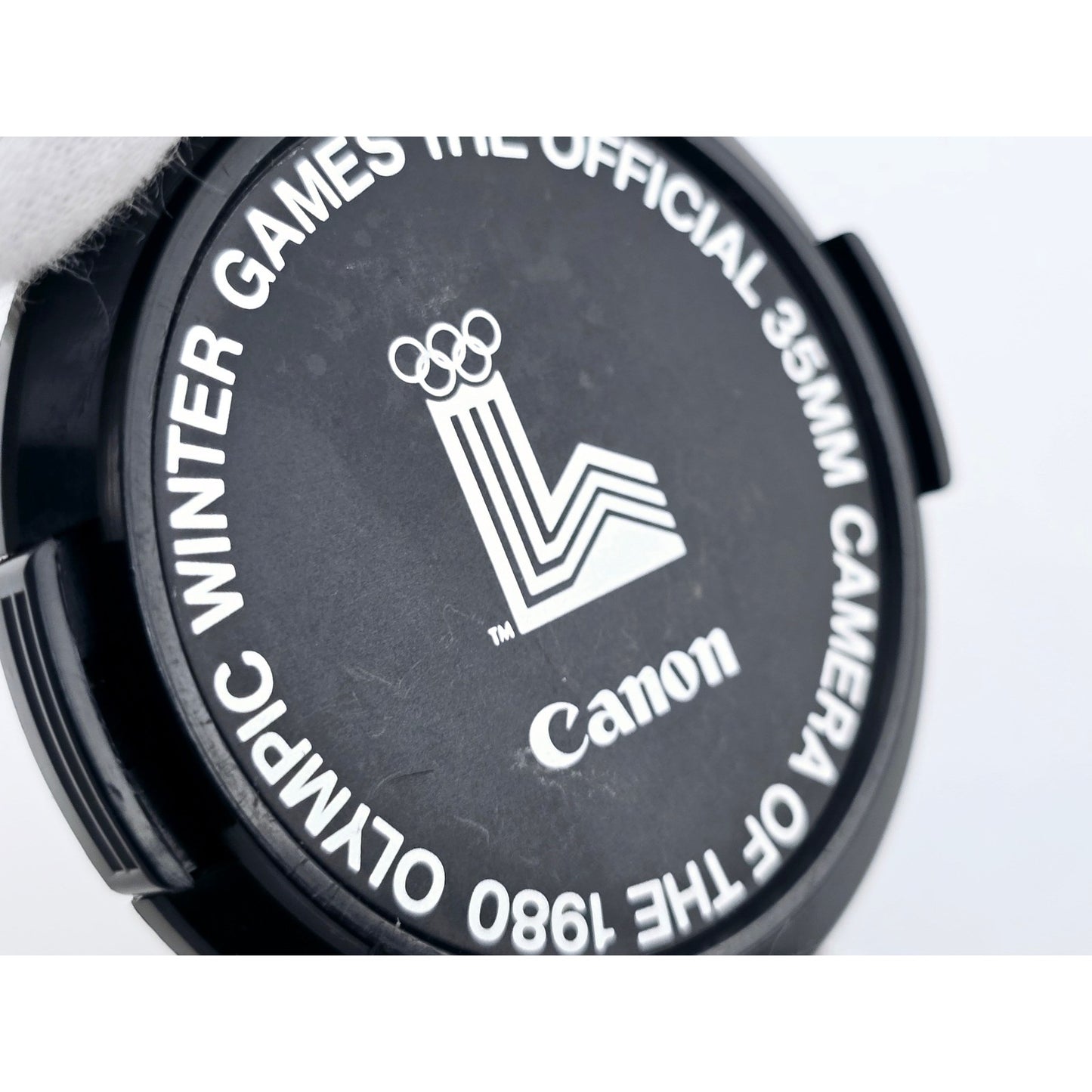 [Pre-owned] Canon Camera Of The 1980 Olympic Winter Games 52mm Lens Cap — Near MINT — Japan #4922