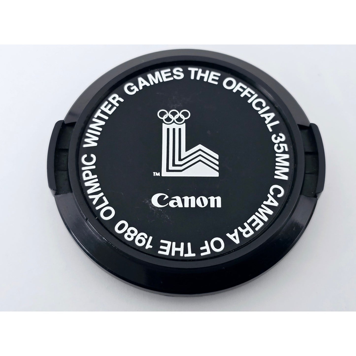 [Pre-owned] Canon Camera Of The 1980 Olympic Winter Games 52mm Lens Cap — Near MINT — Japan #4922
