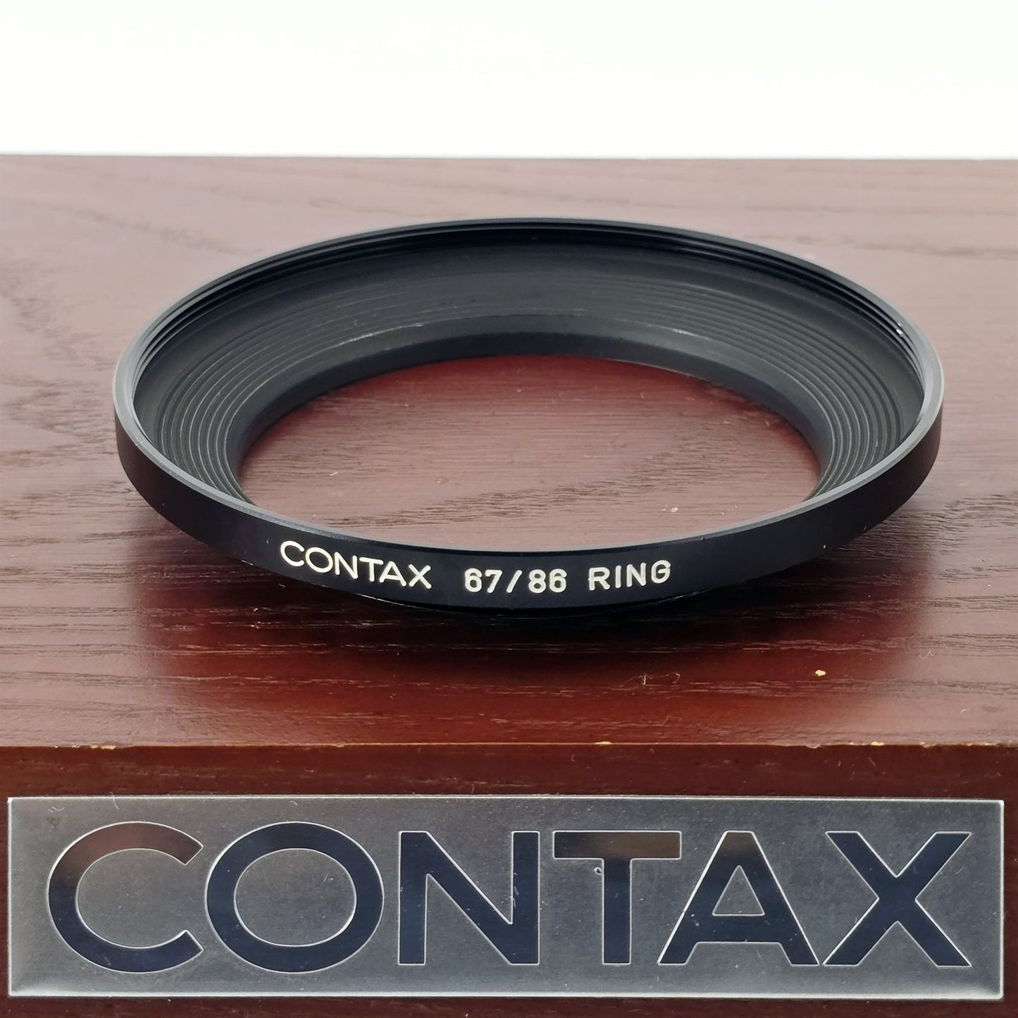 [Pre-owned] Contax 67/86 Step-Up Ring Adapter Filter Ring (Black) — Near Mint — Japan #5602