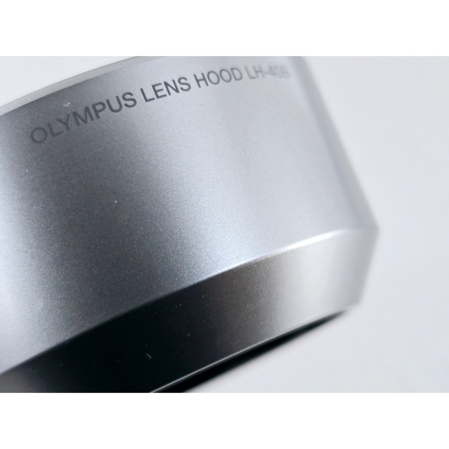 [Pre-owned] Olympus Pen LH-40B Lens Hood Silver for M.Zuiko Digital 45mm F1.8 — MINT — Japan #4088