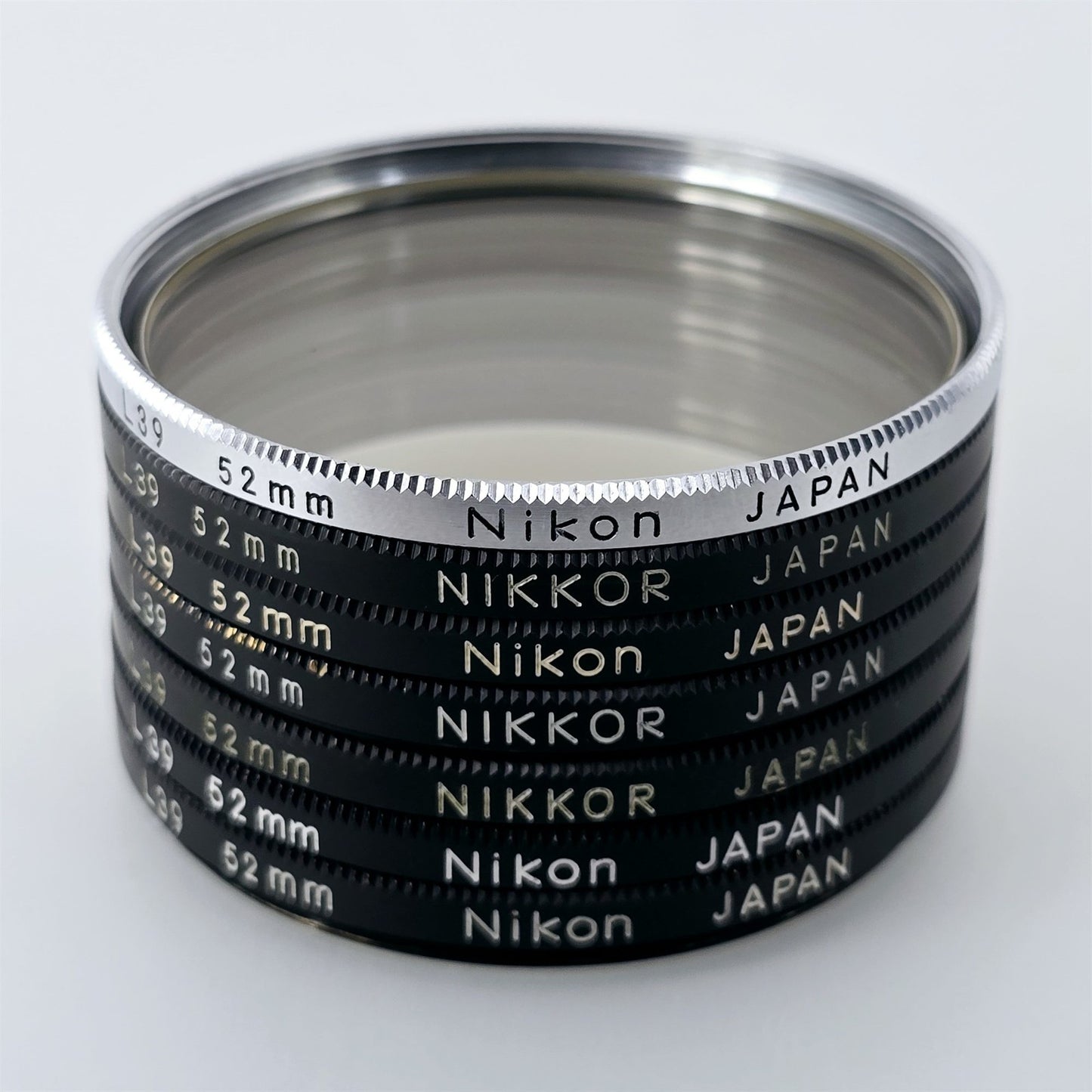 [Pre-owned] Nikon L39 52mm UV Protective Lens Filter (Set of 7) — Near Mint — Japan #5450