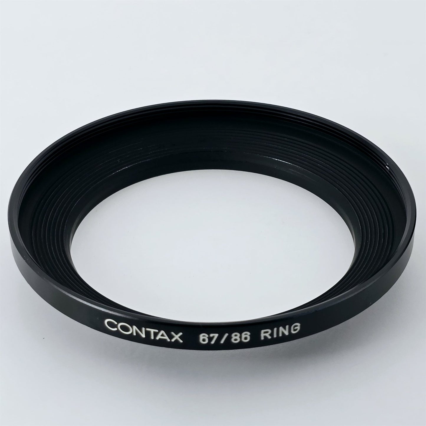 [Pre-owned] Contax 67/86 Step-Up Ring Adapter Filter Ring (Black) — Near Mint — Japan #5602