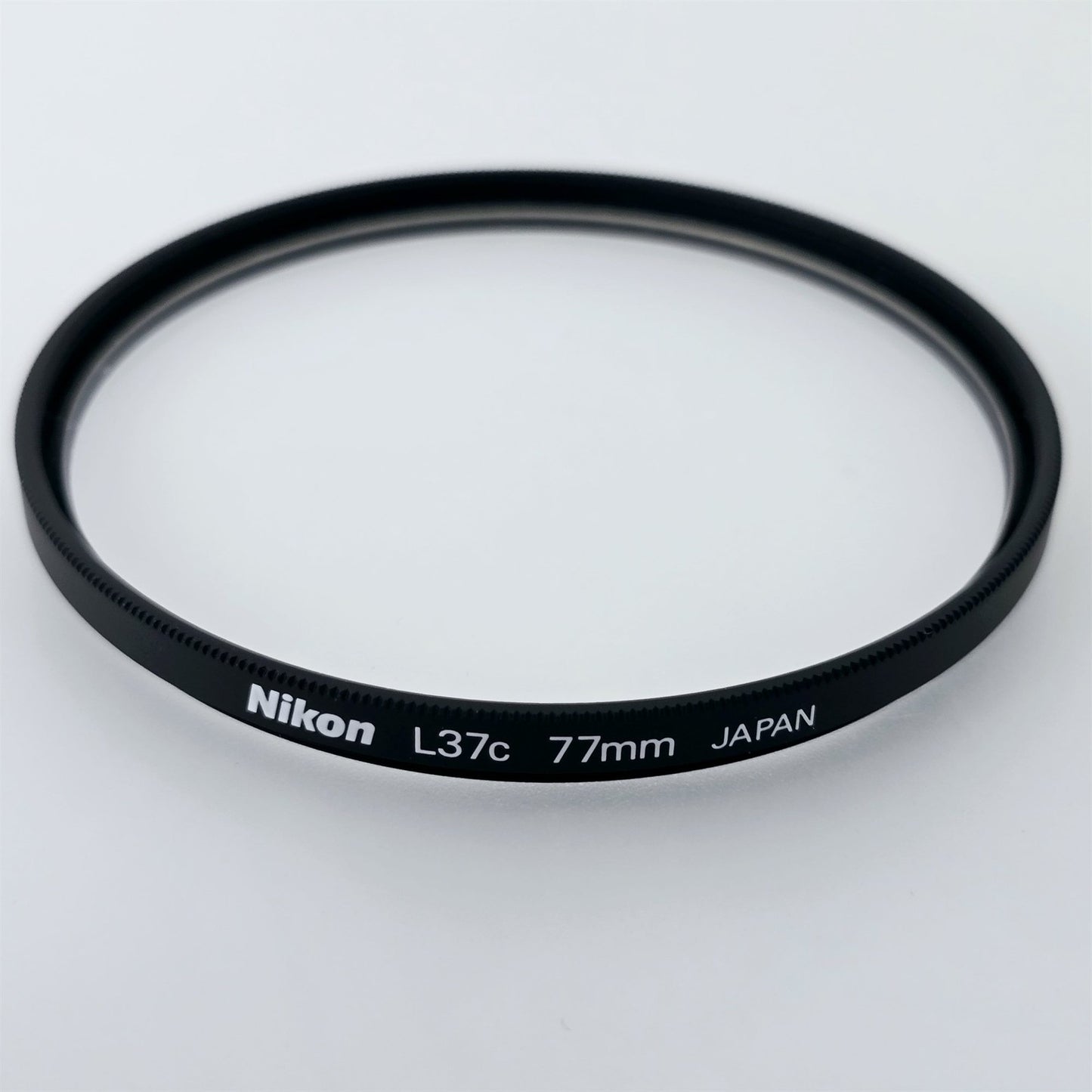 [Pre-owned] Nikon L37C 77mm UV Protective Lens Filter — Mint — Japan #5470